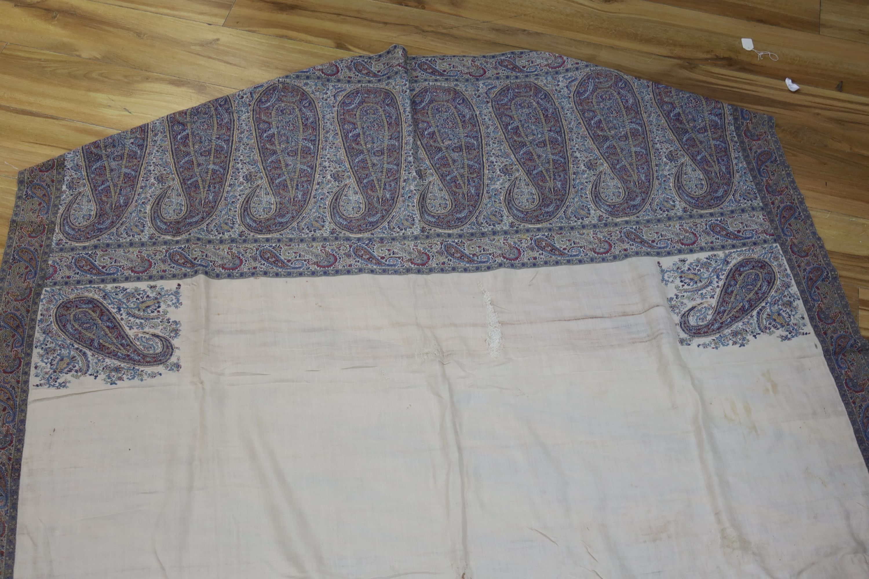 A 19th century Paisley bordered summer shawl